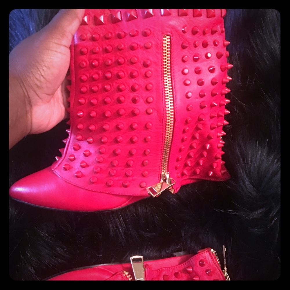 Red spiked leather shoes